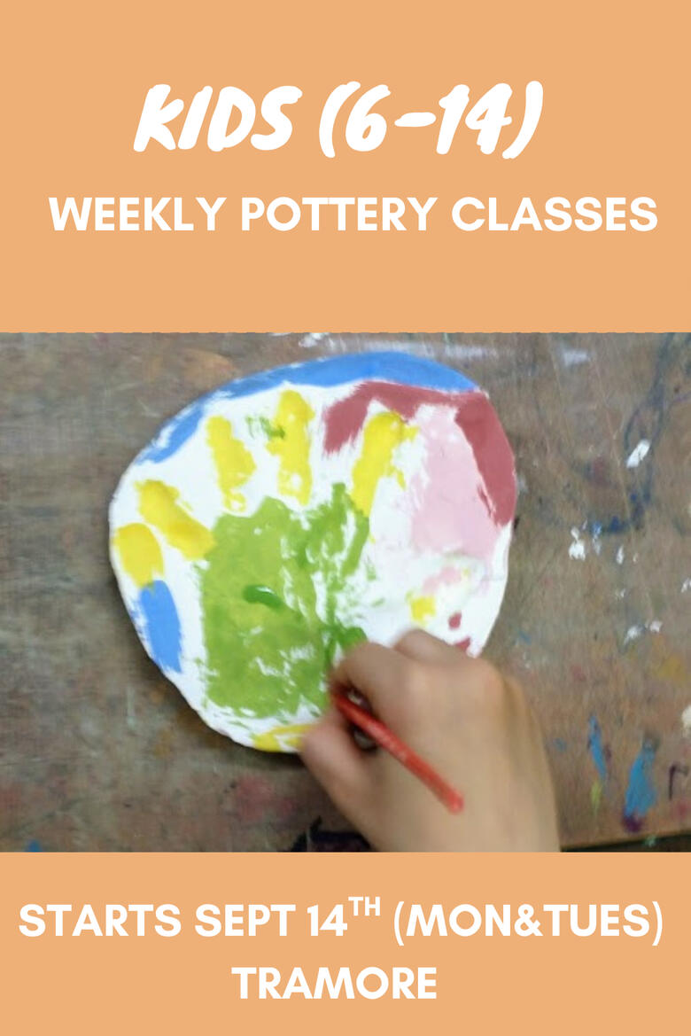 Unfired clay figurines sahped like bunnies made by a child in a pottery class