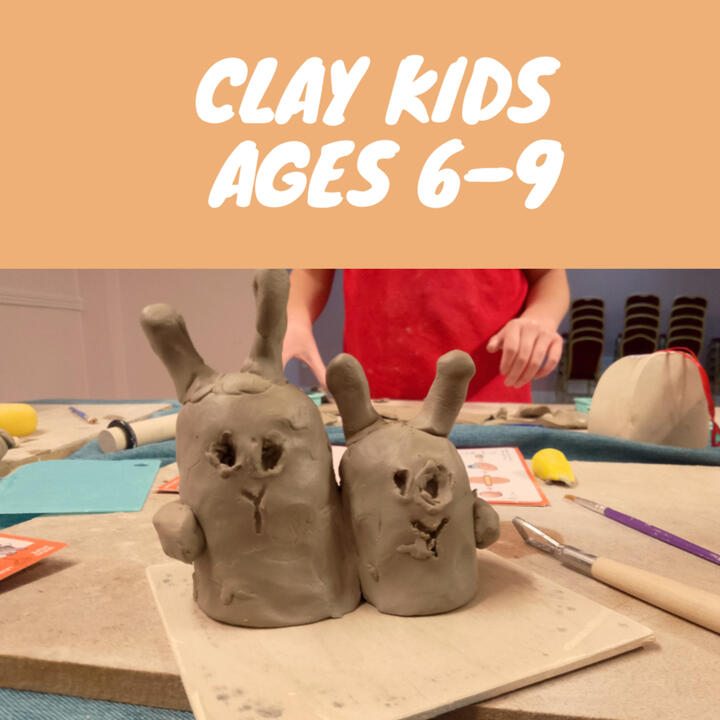 Close up of unfired clay figurines shaped like bunnies made by a child during a pottery class
