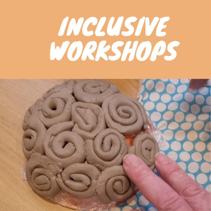 Close up of an elderly person's hand a bowl made out of clay coils during pottery class