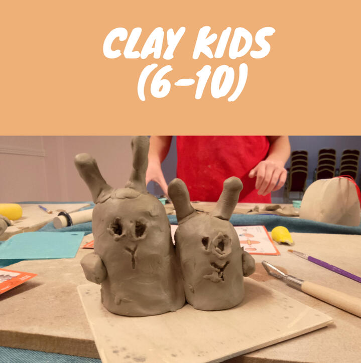 Close up of unfired clay figurines shaped like bunnies made by a child during a pottery class
