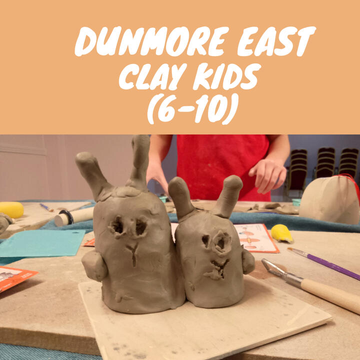Close up of unfired clay figurines shaped like bunnies made by a child during a pottery class